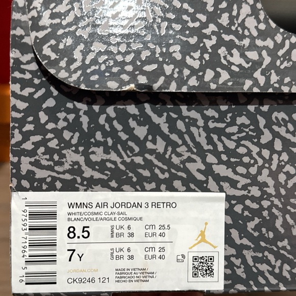 Jordan White and Orange Athletic Shoes with Signature Design
